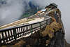 105963_Schutzhaus zur Himmelspforte Foto am Schafberg-Felsen in 1783m Seehöhe getaucht in Wolkenstimmung am Abgrund