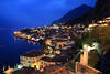 Limone cityscape nightly lights on Lake Garda romantic blue water picture mount skyline photography