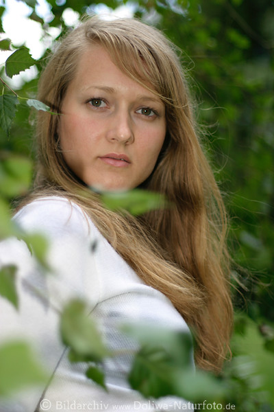 Girl long hair face in the leaf-tangle portrait blonde pretty young women